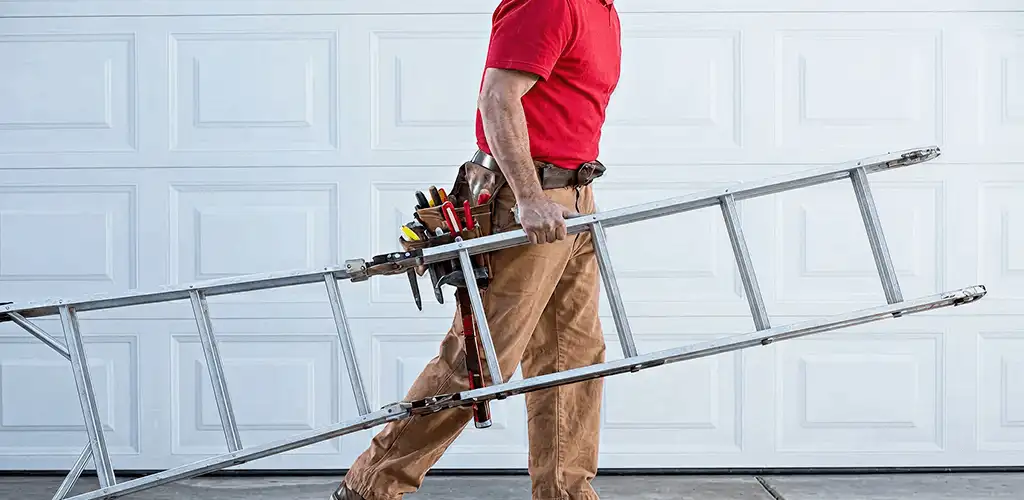 Garage door repair technician arriving with tools and ladder in Springfield, MO