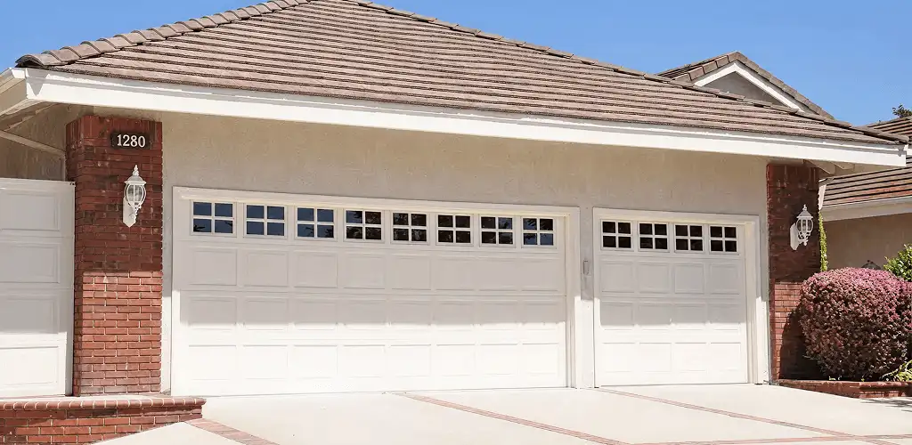 Residential garage door repair service for a double garage door in Springfield, MO