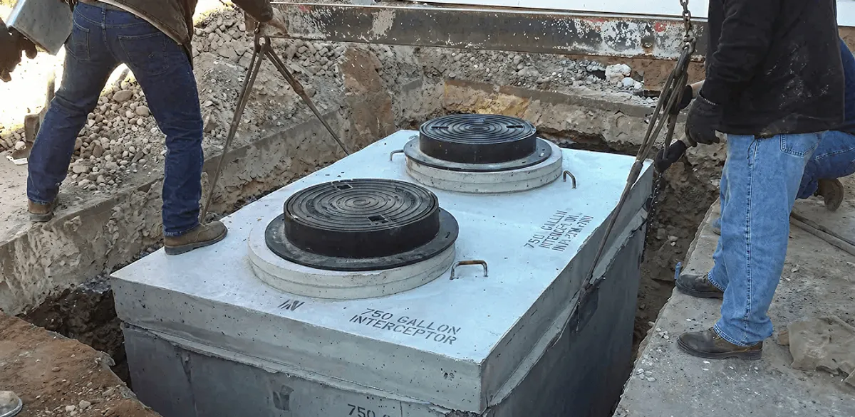 Grease trap installation for a commercial property drainage system in Springfield, MO
