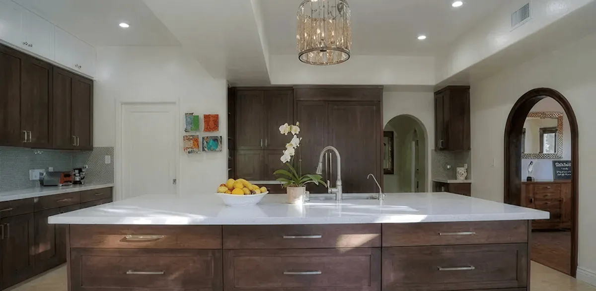 Cabinet refacing project with updated kitchen cabinets and island in Springfield, MO